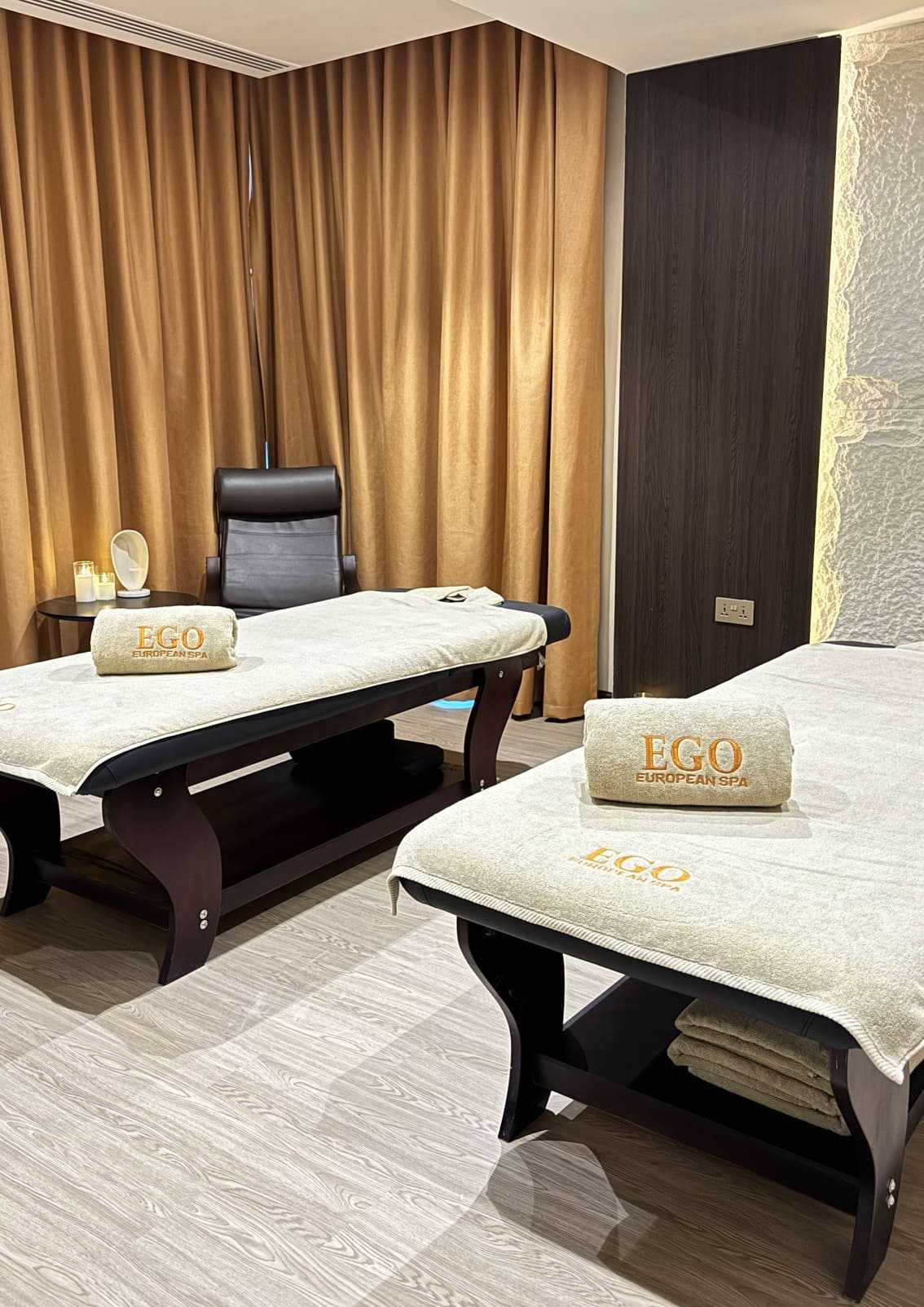 Deep tissue massage at Ego European Spa Dubai — therapist working tension area